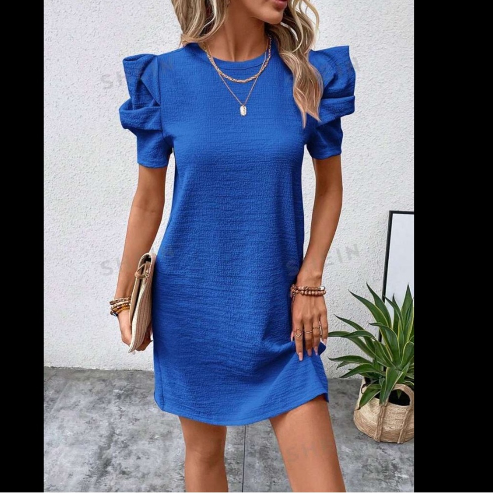 Royal blue puff sleeve dress. Size large. Never worn